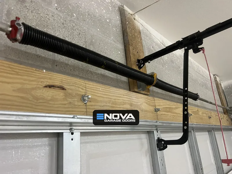 Garage door torsion spring after a cable repair in St. Petersburg, FL